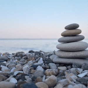 meditative stack of rocks on a beach